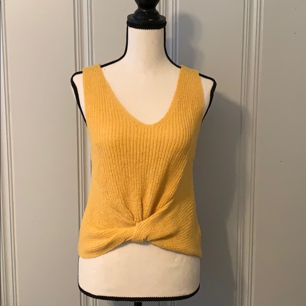 Sleeveless twist front sweater